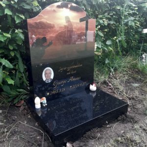 picture of installed peaceyard upright gravestone, Cora in night sky material with customer graphics